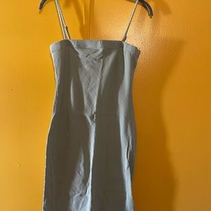 It’s a pastel green dress “. Size Medium